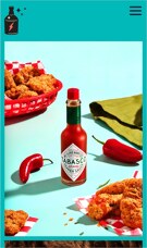 「Portfolioboxウェブサイトビルダーを使用して作成されたサンプルサイトのスクリーンショット。」